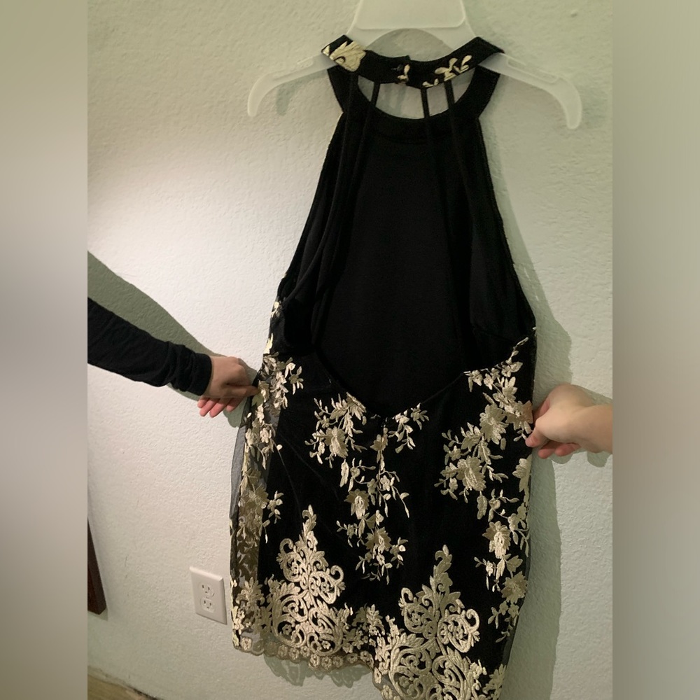 A large women’s dress from Charlotte Russe black and gold